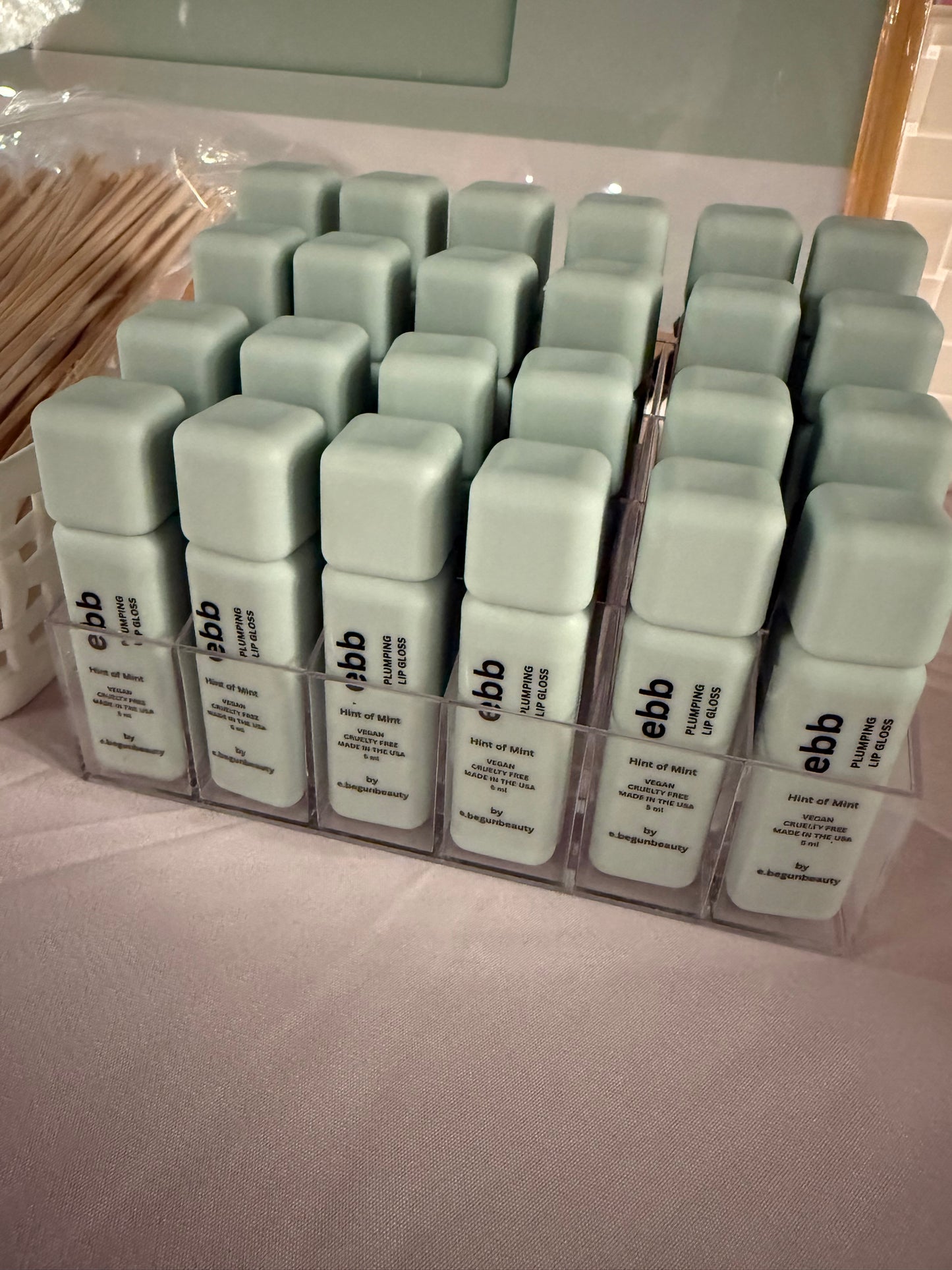ebb hydrating plumping lip gloss